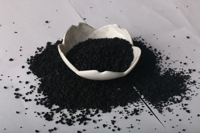 Activated carbon for oil sweetening catalysts